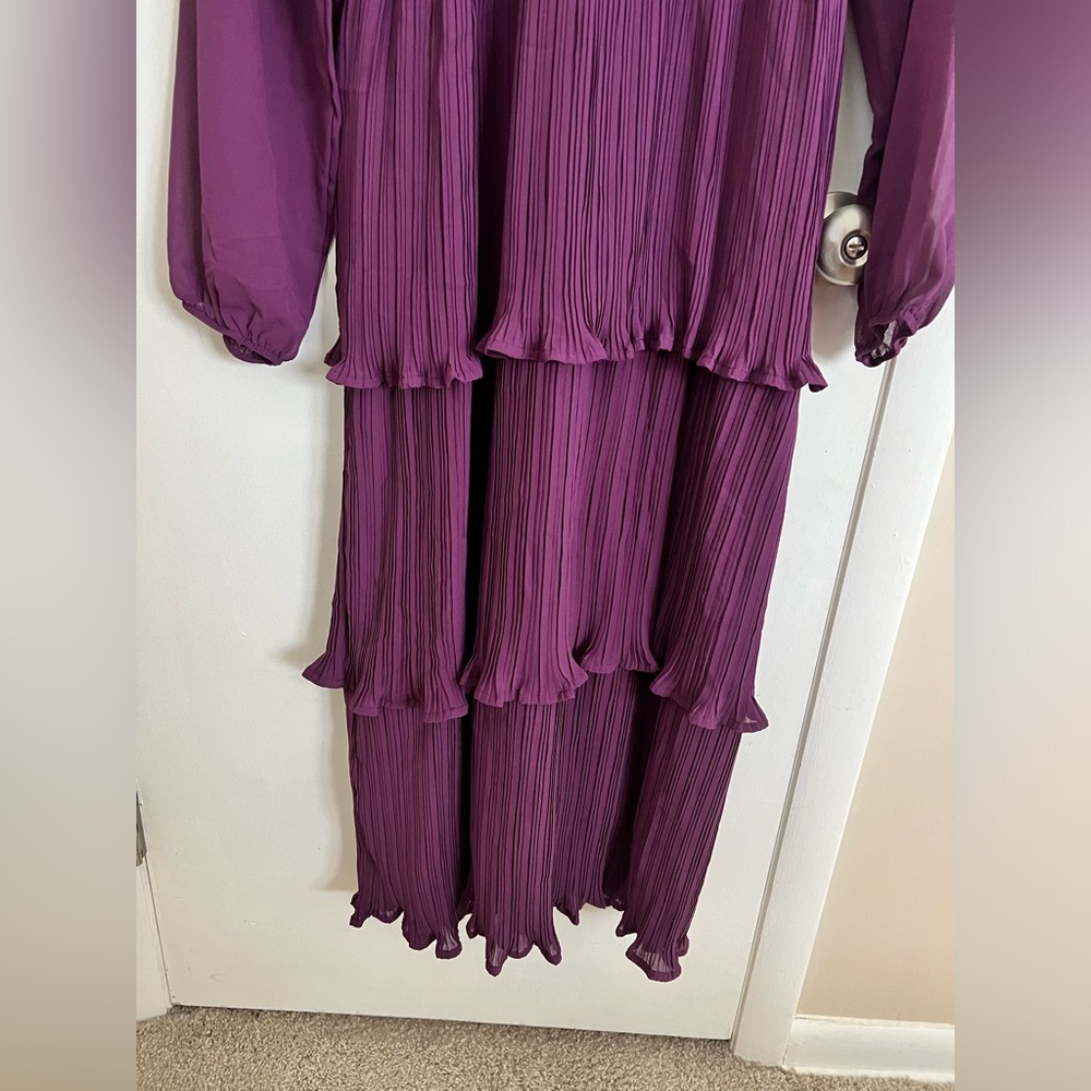 Beautiful tiered dress with sheer sleeves. Brand new, with tags, never worn.